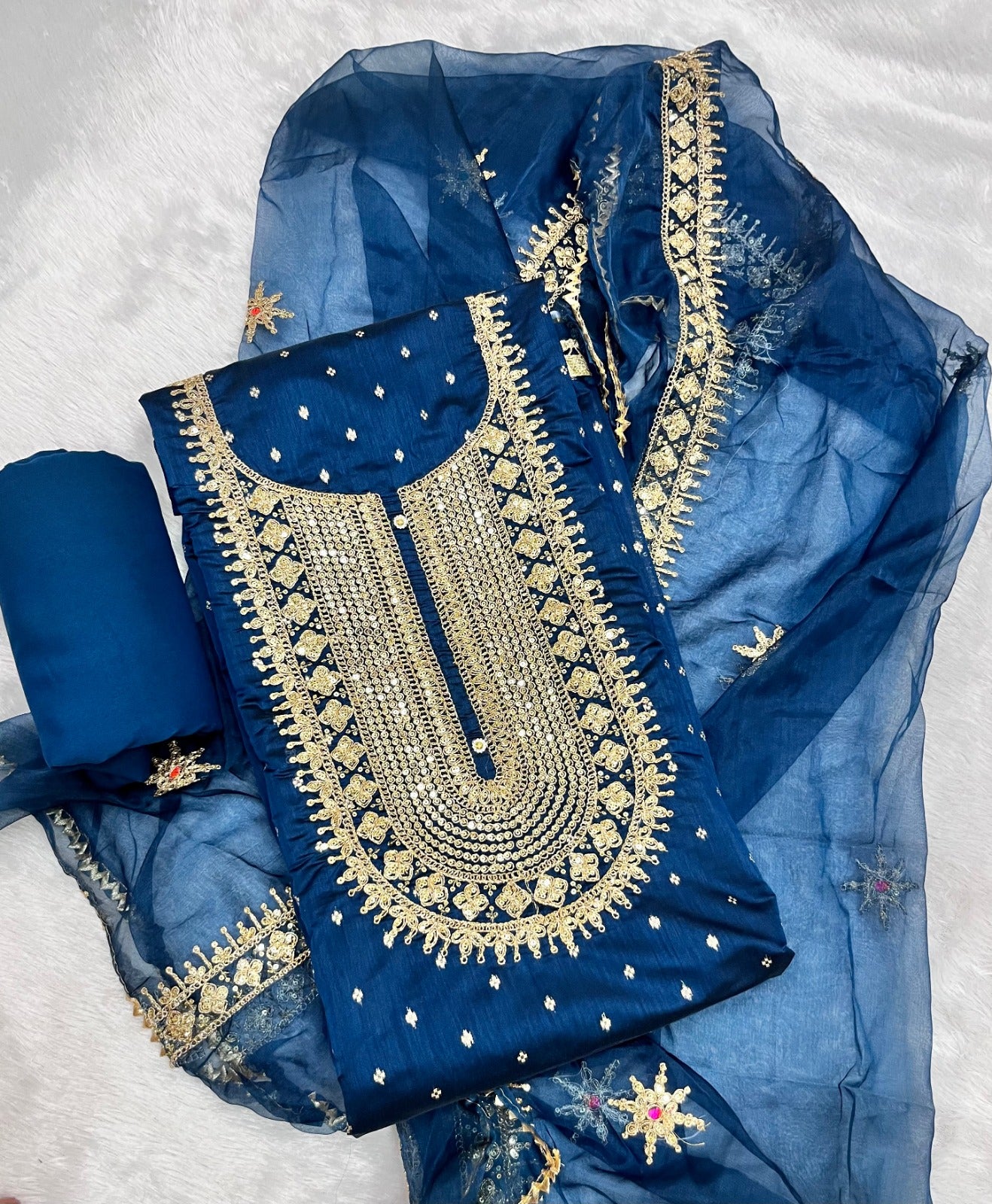 Top modal butti bottom inner heavy crep dupatta organza work Suit