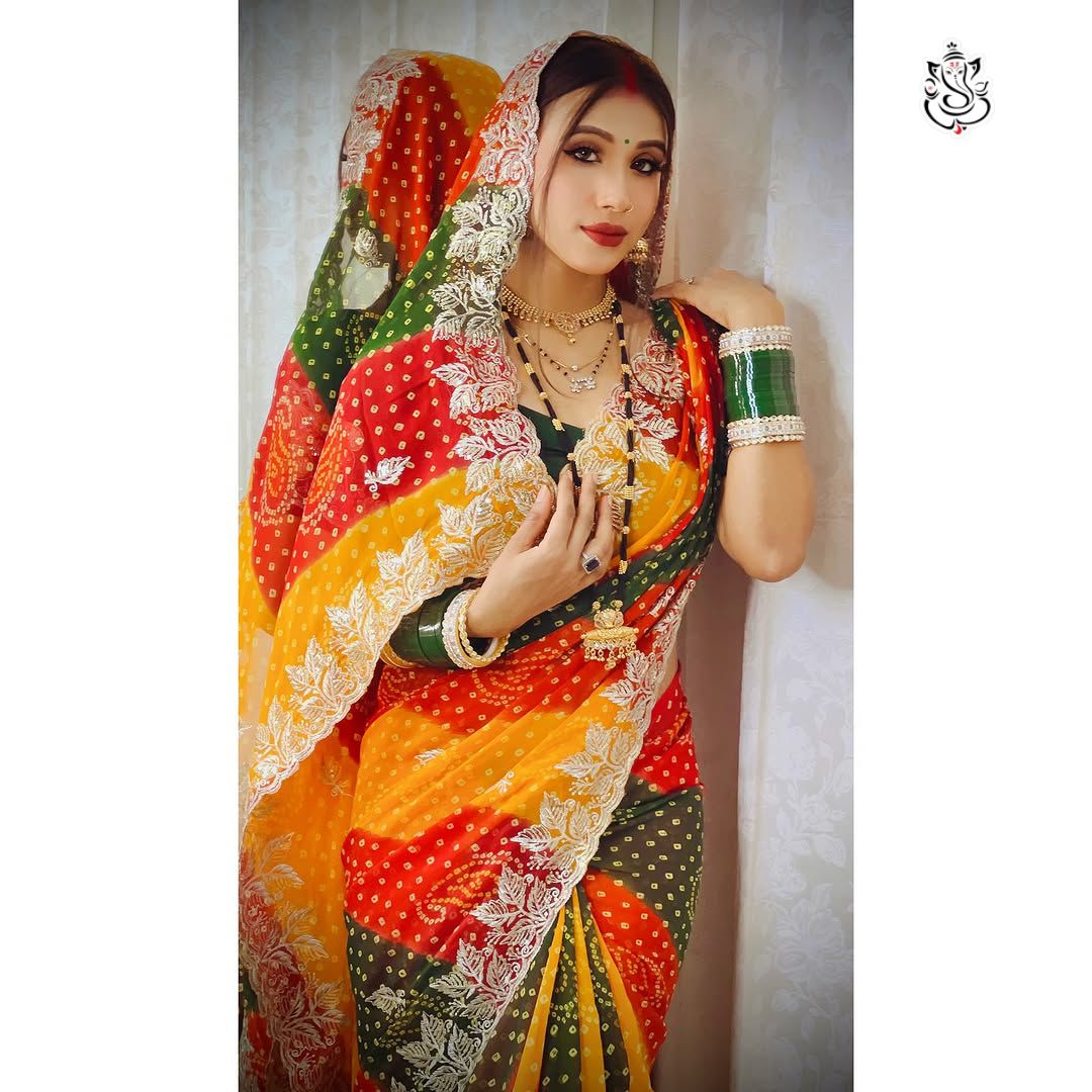 Soft Georgette  Bhandhini Print Saree With Heavy c-Pallu Seqance Zari Work With Butti In Whole Saree