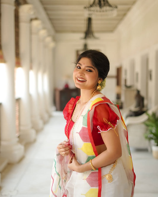 This beautiful linen cotton saree features a stunning digital temple print border