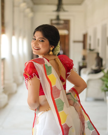 This beautiful linen cotton saree features a stunning digital temple print border
