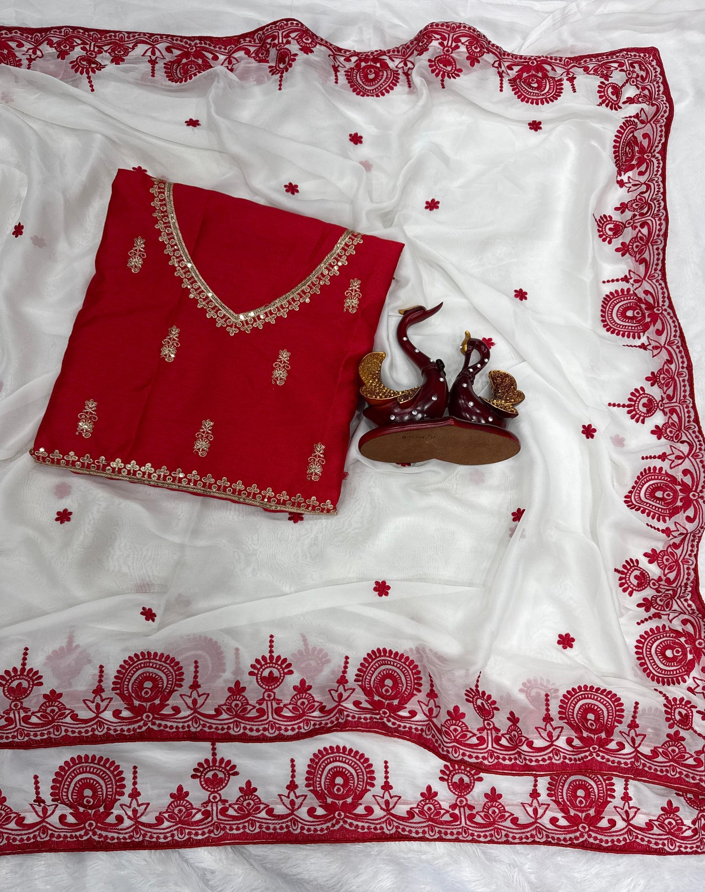 For this upcoming festival, present some special red&white saree collection by Nice Creation...