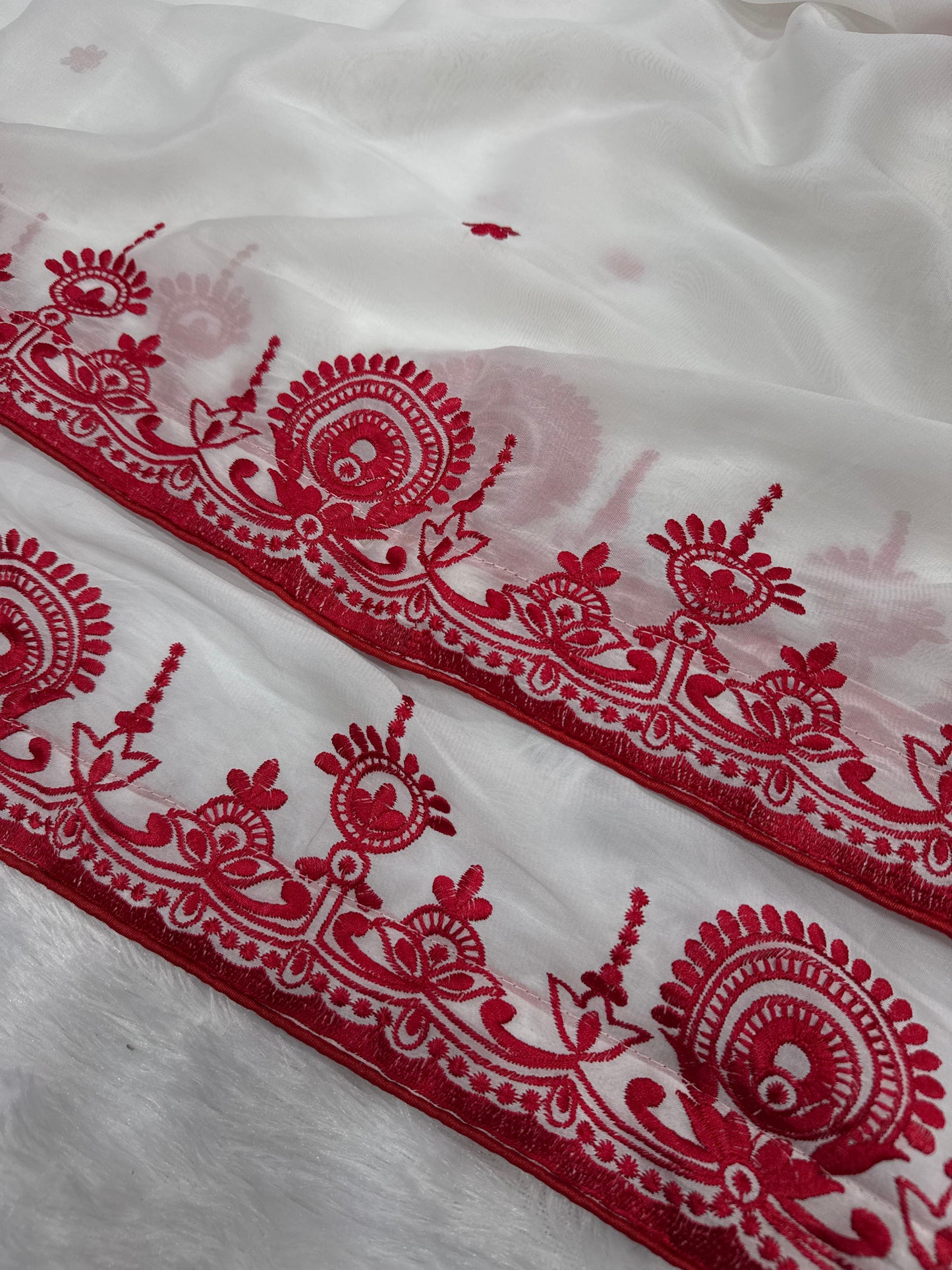 For this upcoming festival, present some special red&white saree collection by Nice Creation...