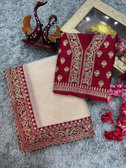 😍Unveil your inner fashionista with our stunning muted Champaign gold designer saree paired with the most sought-after Embroidery blouse in rich red.