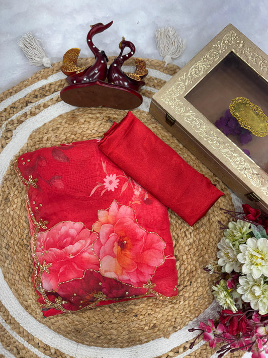 Exuding grace and sophistication, this floral-printed organza saree blends classic beauty with modern elegance
