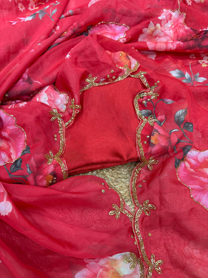 Exuding grace and sophistication, this floral-printed organza saree blends classic beauty with modern elegance