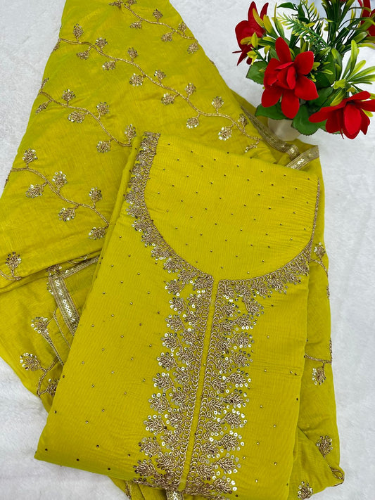 Elevate your ethnic wardrobe with this elegant 3-piece unstitched suit set, blending luxurious fabrics and intricate detailing