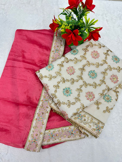 Elevate your ethnic wardrobe with this elegant 3-piece unstitched suit set, blending luxurious fabrics and intricate detailing