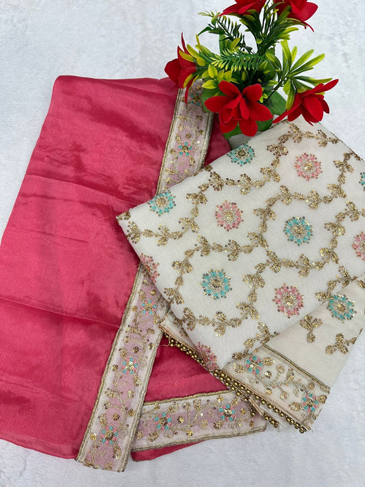 Elevate your ethnic wardrobe with this elegant 3-piece unstitched suit set, blending luxurious fabrics and intricate detailing