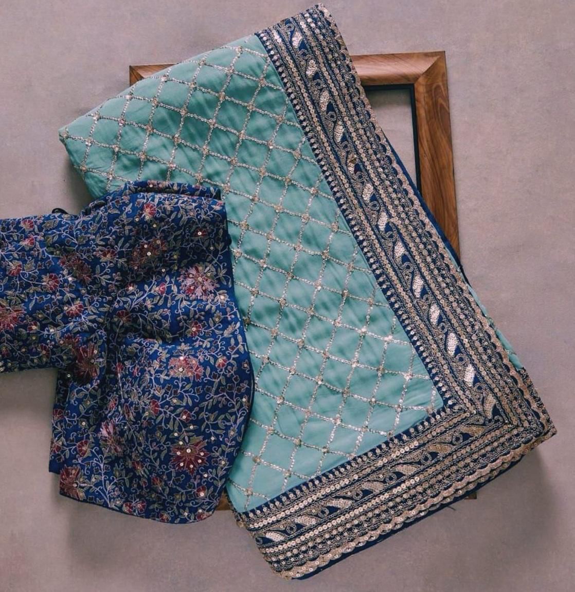 Exclusive Heavy Georgette Saree with Rich Embroidery & Tapeta Silk Blouse