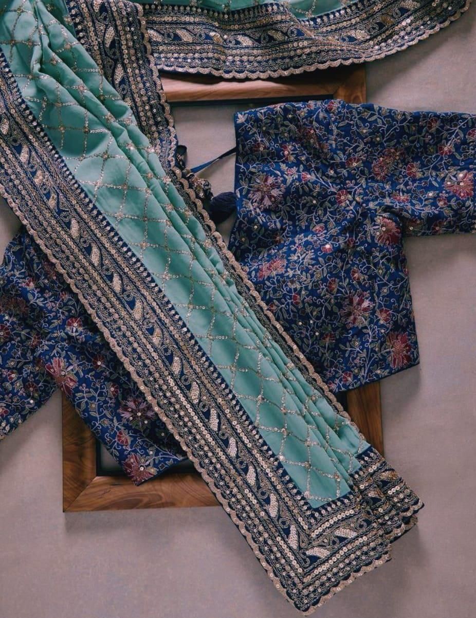 Exclusive Heavy Georgette Saree with Rich Embroidery & Tapeta Silk Blouse